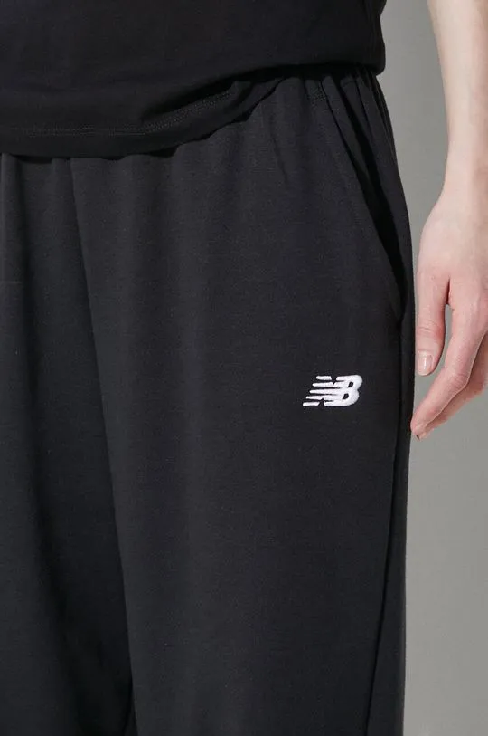 New Balance joggers Sport Essentials black color smooth WP41500BK