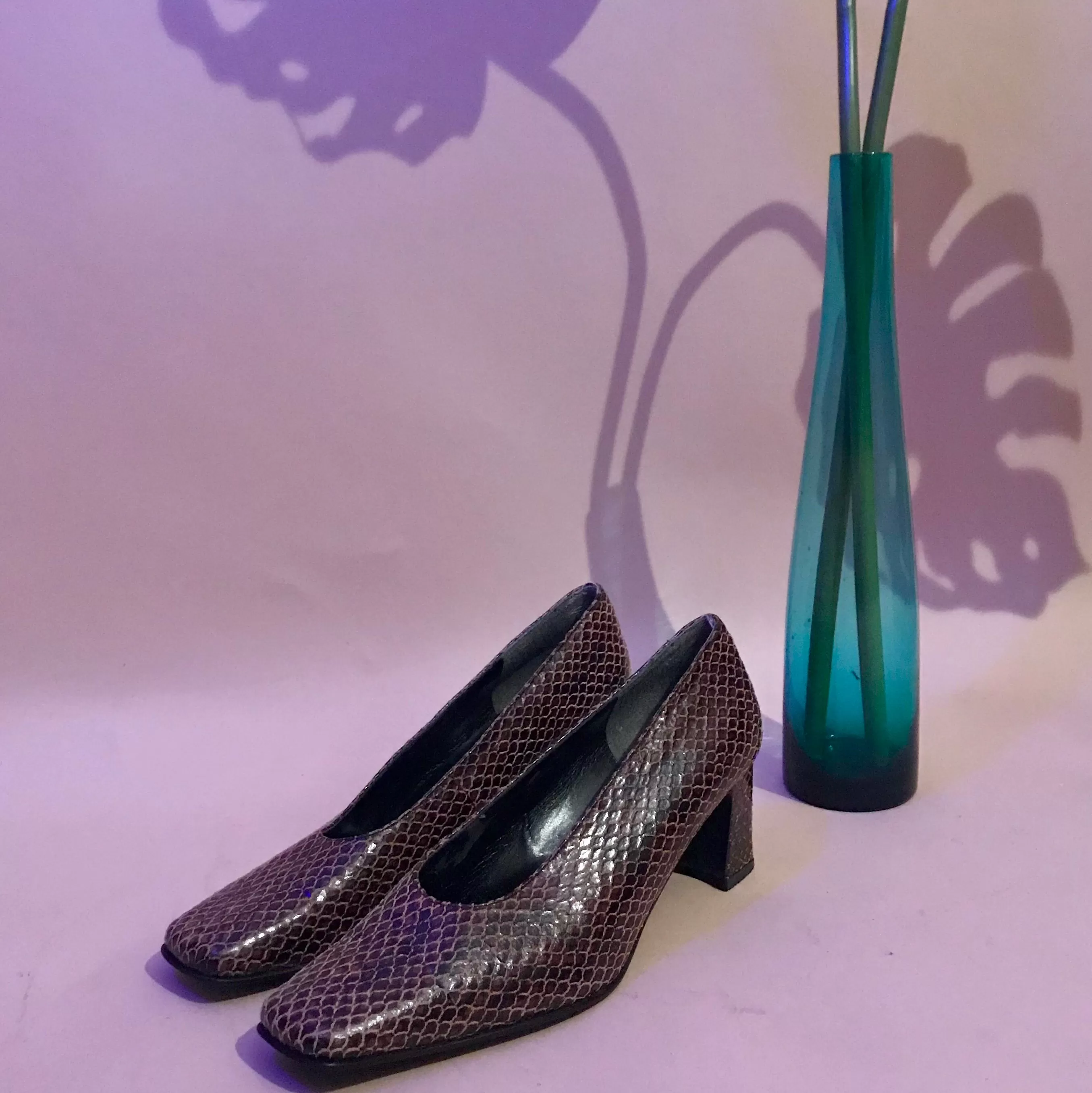 Snakeskin slipper heels