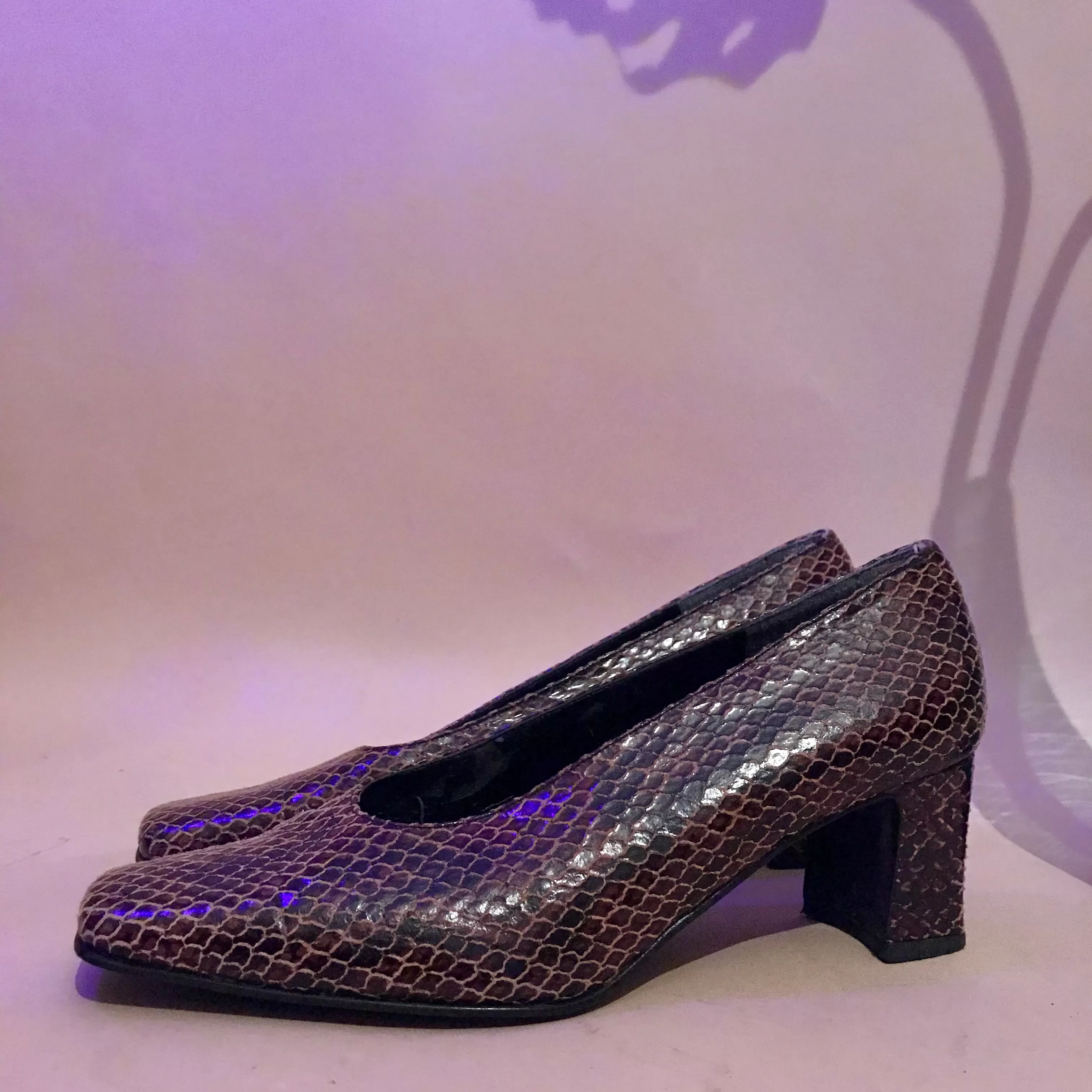 Snakeskin slipper heels